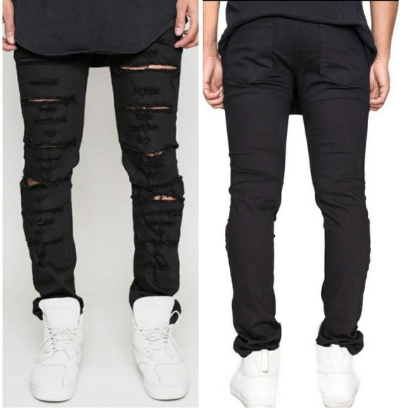 tattered black jeans